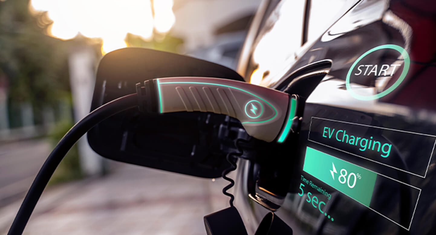 Electric vehicle charging with illuminated cable and digital display showing 80% charge.